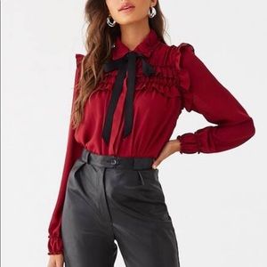Ruffle tie blouse size M